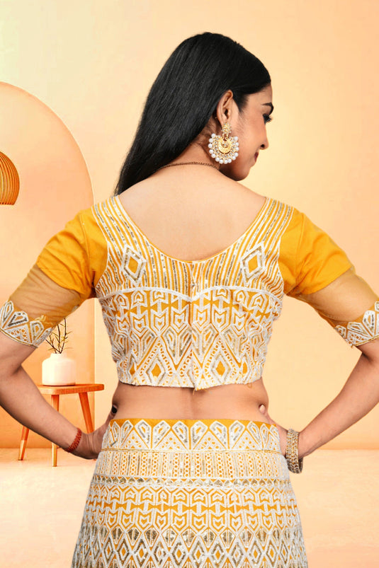 Charming Yellow Color Net Fabric Sequins Work Lehenga