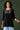 Embroidered Work Creative Rayon Fabric Short Kurti In Black Color