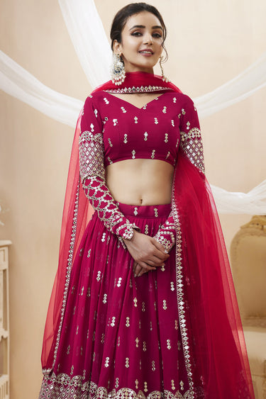 Tempting Georgette Fabric Rani Color Wedding Wear Lehenga Choli With Embroidered Work