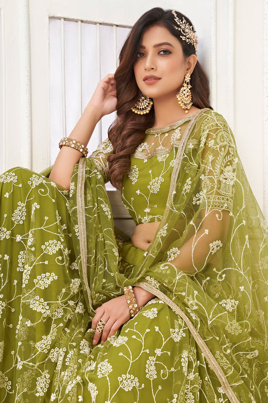 Engaging Green Color Net Fabric Embroidered Work Lehenga Choli