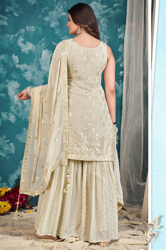 Komal Vora Tempting Georgette Cream Color Sharara Suit