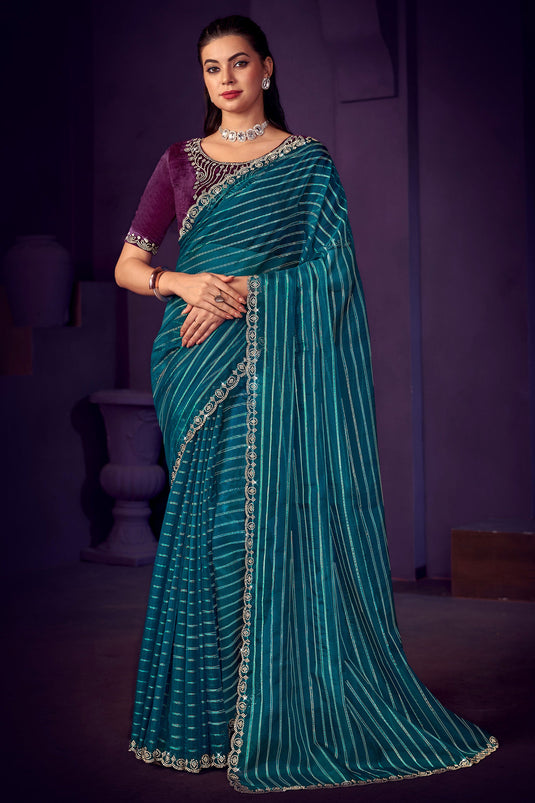 Attractive Stone Work Organza Fabric Saree In Teal Color