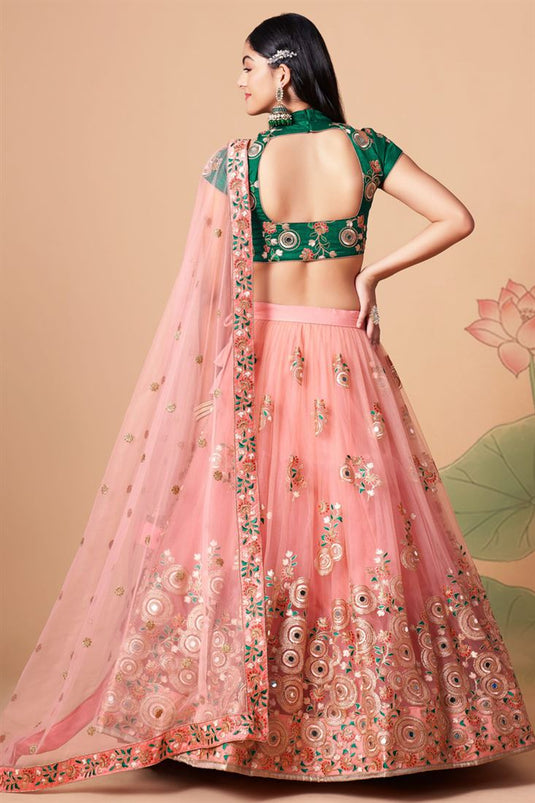 Dazzling Sangeet Wear Peach Color Lehenga Choli In Net Fabric