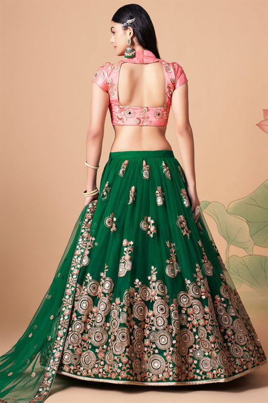 Entrancing Net Fabric Sangeet Wear Lehenga Choli In Green Color