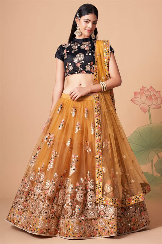 Mesmeric Golden Color Sangeet Wear Lehenga Choli In Net Fabric