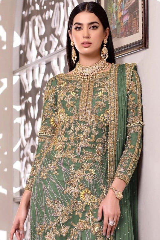 Sea Green Color Party Wear Net Fabric Charismatic Pakistani Replica Suit