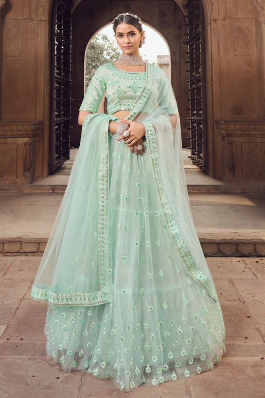 Excellent Net Fabric Sea Green Color Embroidered Work Lehenga