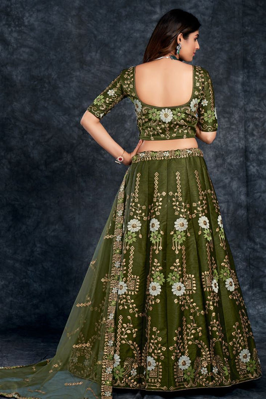 Silk Fabric Mehendi Green Color Sangeet Wear Soothing Lehenga