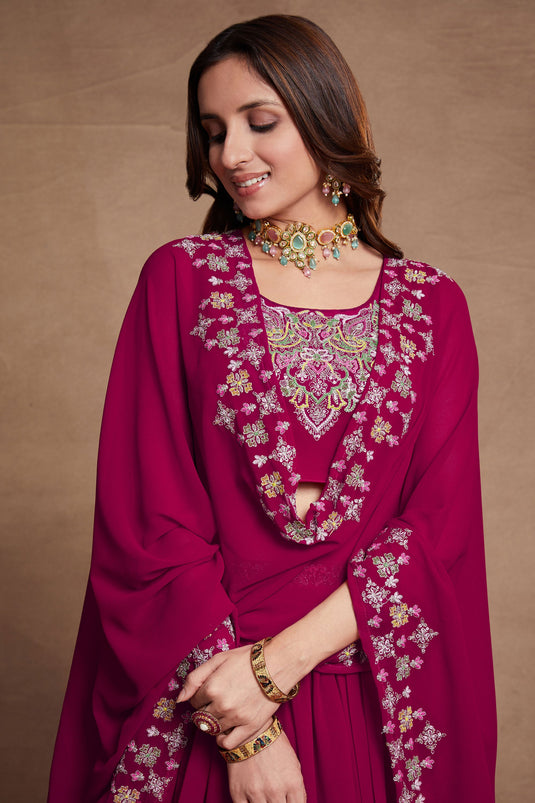 Georgette Fabric Sangeet Wear Embroidered Lehenga Choli In Rani Color