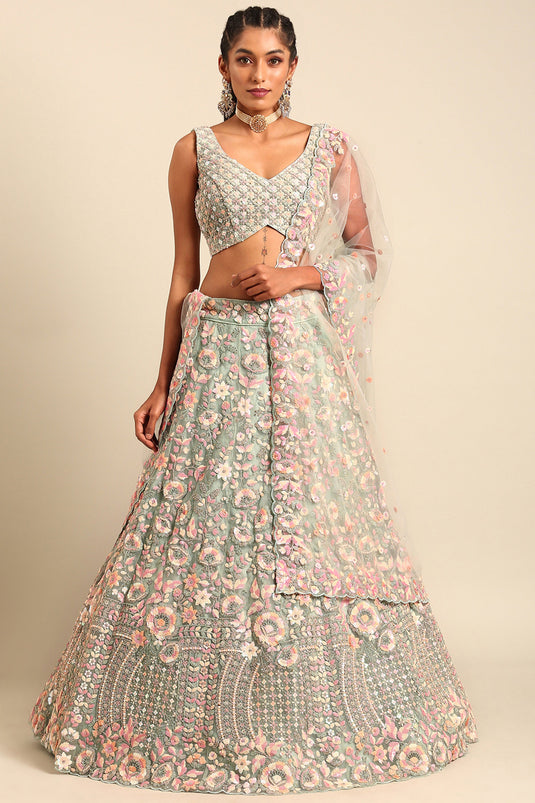 Sea Green Sequins Work Designs Wedding Wear Lehenga And Enigmatic Blouse