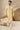 Intriguing Cream Kurta Pyjama In Banarasi Art Silk Fabric