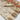 Weaving Work On Tissue Fabric Bewitching Saree In Off White Color