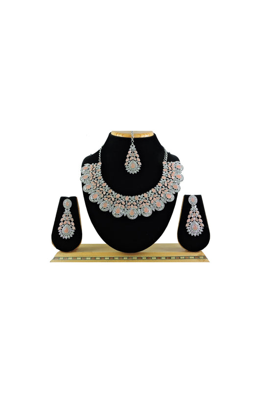 Embellished Peach Color Alloy Material Necklace with Earrings and Mang Tikka