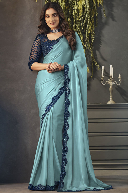 Beautiful Light Cyan Color Satin Fabric Lace Border Work Saree With Embroidered Blouse