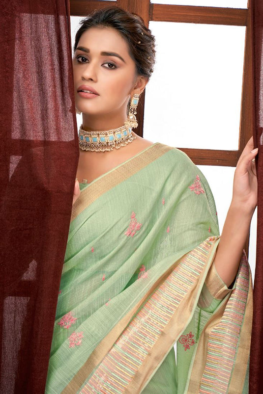 Function Wear Linen Fabric Sea Green Color Engaging Weaving Work Saree