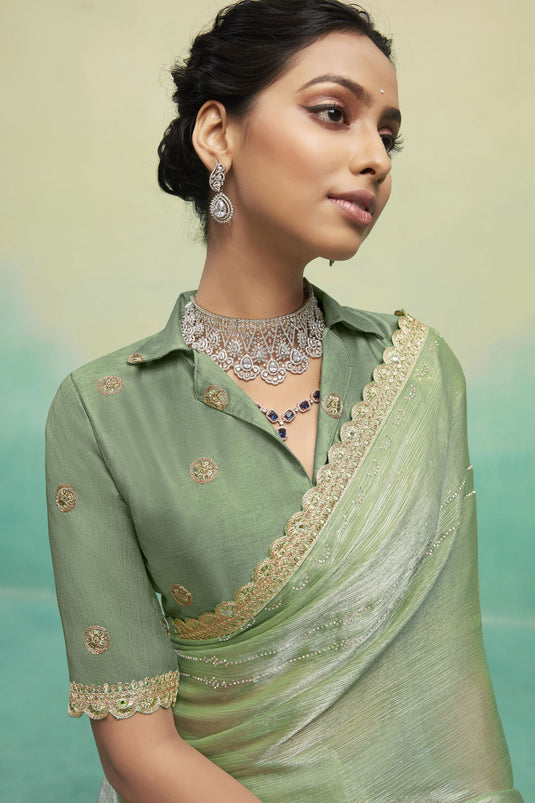 Function Wear Chiffon Fabric Lace Border Work Sea Green Color Saree With Embroidered Blouse