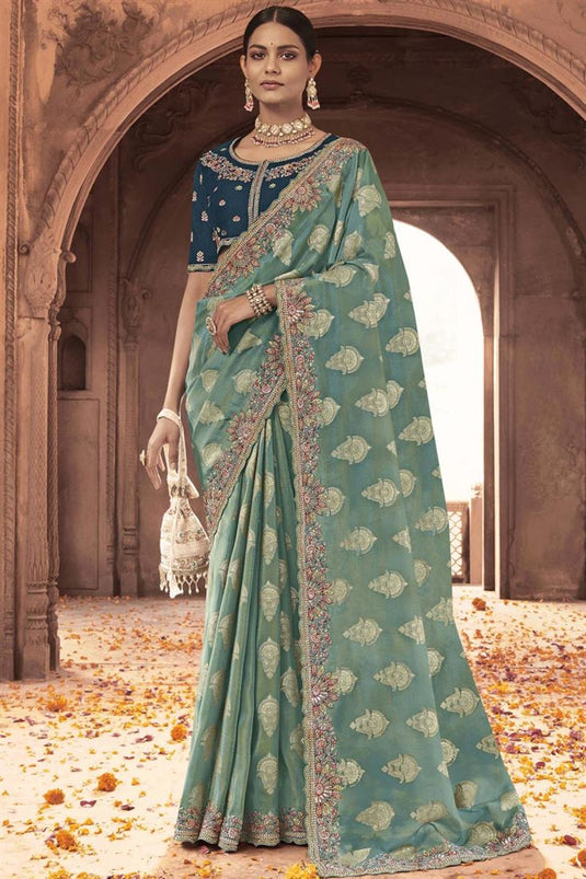 Incredible Embroidered Work On Sea Green Color Tissue Silk Saree