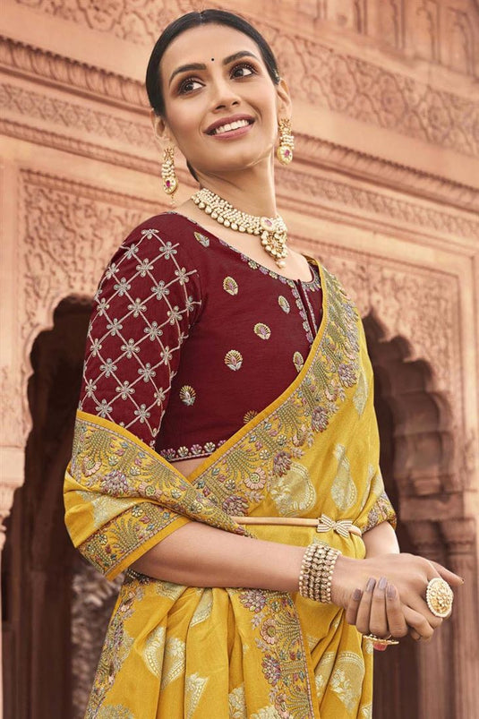 Tempting Yellow Color Tissue Silk Saree With Embroidered Work