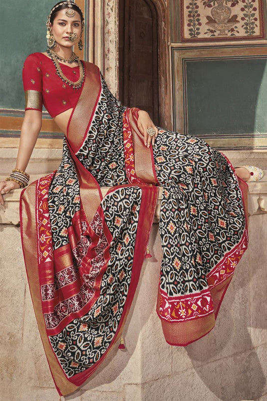 Patola Silk Black And White Color Intriguing Printed Saree