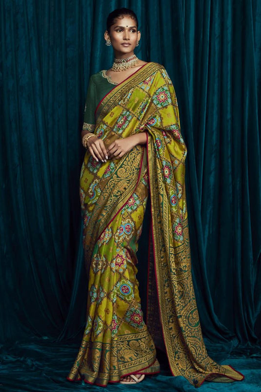 Festive Wear Brasso Silk Fabric Green Color Printed Saree With Embroidered Blouse