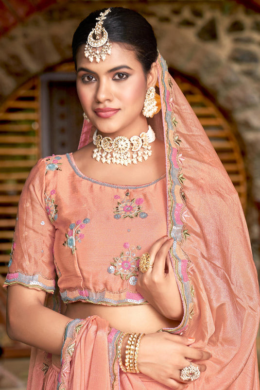 Embroidered Peach Color Wedding Wear Lehenga Choli In Chinon Fabric