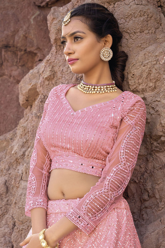 Net Fabric Bridal Lehenga Choli With Fancy Work In Pink Color