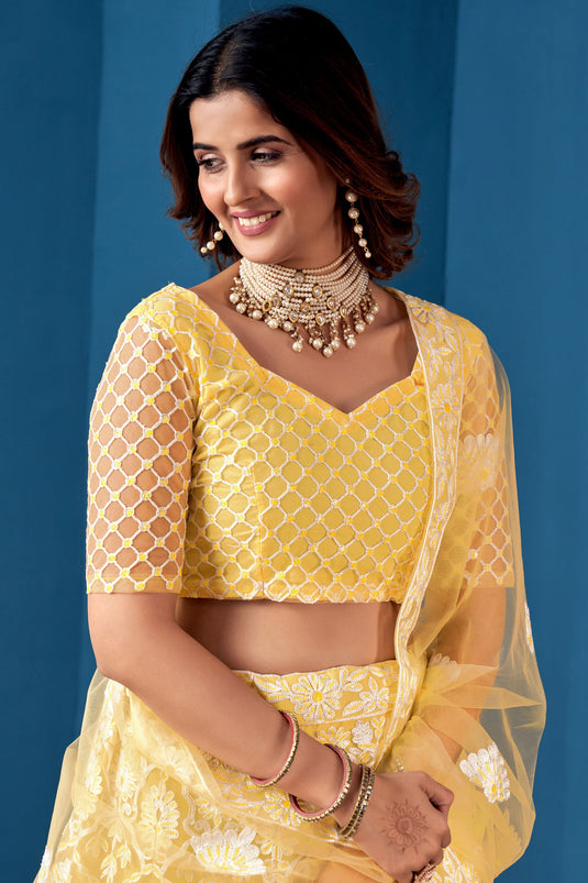 Embroidered Yellow Color Lehenga Choli In Net Fabric