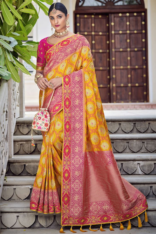 Radiant Yellow Color Wedding Wear Banarasi Fabric Saree With Weaving Work