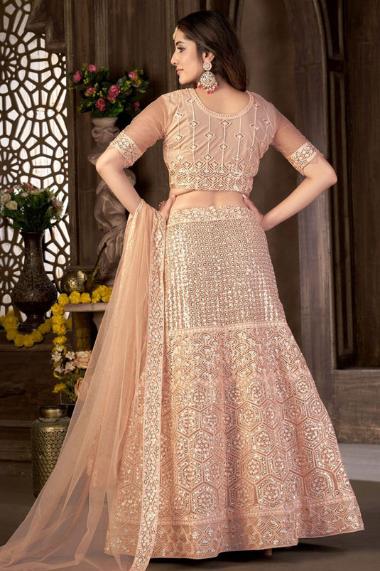 Peach Color Net Fabric Heavy Sequins Work Traditional Lehenga