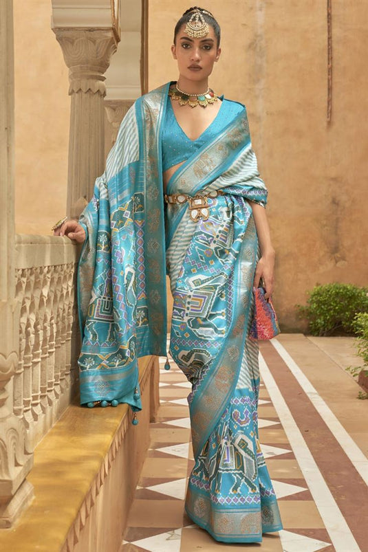 Aristocratic Cyan Color Art Silk Fabric Printed Saree