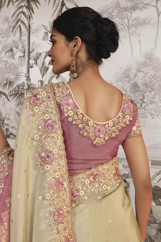Heavy Embroidery Work Engaging Beige Color Fancy Fabric Saree With Party Look Blouse