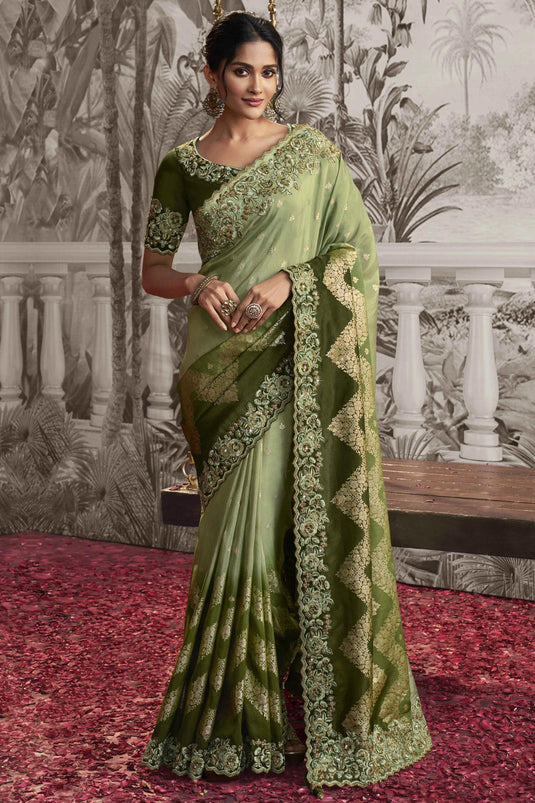 Delicate Green Color Heavy Embroidery Work Fancy Fabric Saree With Party Look Blouse