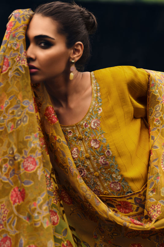 Charm Muslin Silk Embroidered Pakistani Salwar Kameez In Yellow Color