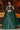 Net Fabric Sangeet Wear Precious Sequins Work Lehenga In Dark Green Color