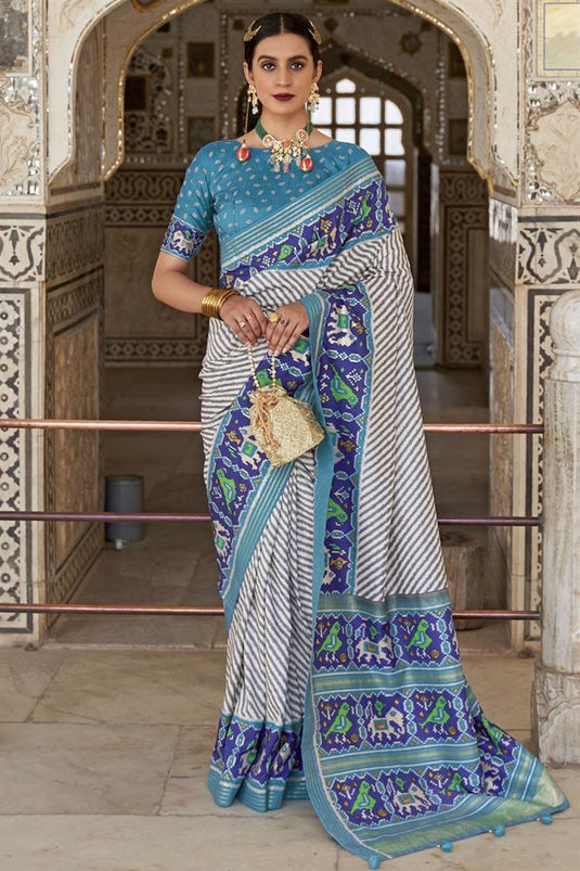 Art Silk Fabric Function Wear Sky Blue Color Patola Printed Supreme Saree