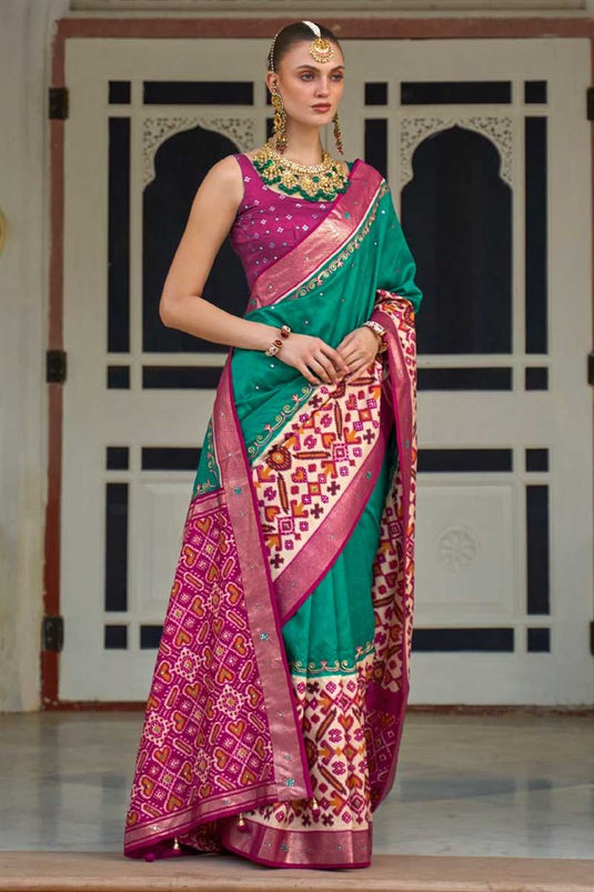 Patola Printed Awesome Art Silk Fabric Saree In Teal Color