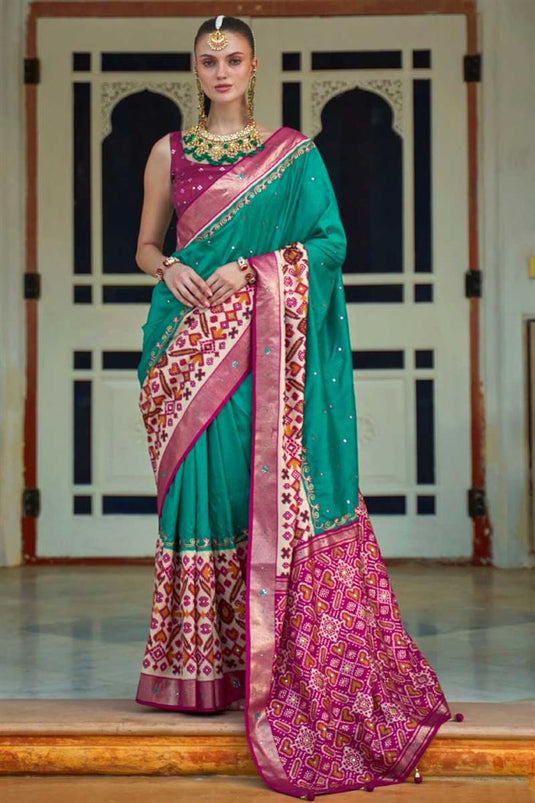 Patola Printed Awesome Art Silk Fabric Saree In Teal Color