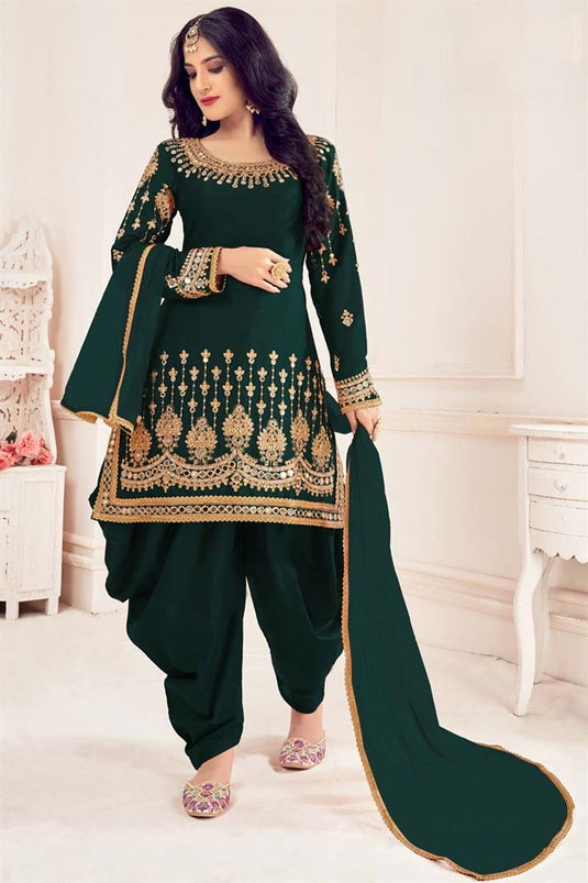 Art Silk Fabric Festival Wear Embroidered Winsome Patiala Suit In Dark Green Color