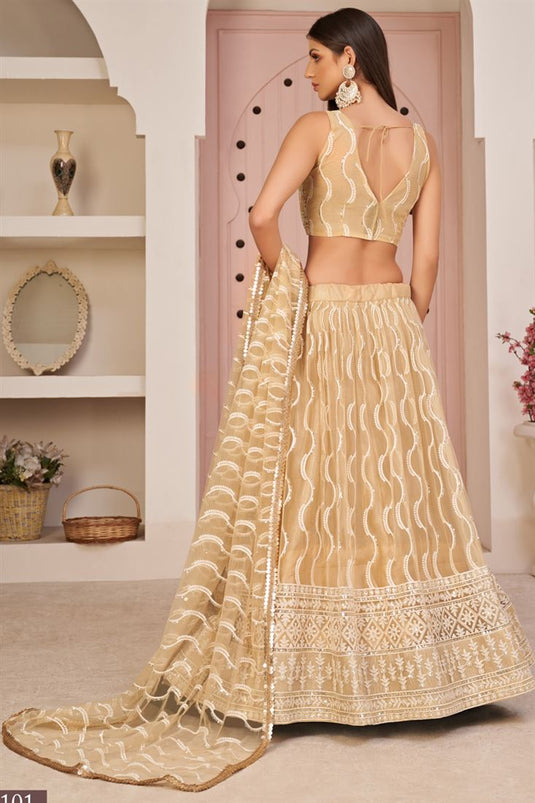 Sangeet Wear Captivating Net Lehenga In Beige Color