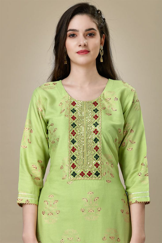 Radiant Green Color Rayon Fabric Kurti With Pant