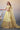 Net Fabric Sequins Work Luminous Lehenga In Cream Color