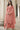 Peach Color Net Fabric Palazzo Suit With Adorning Embroidered Work