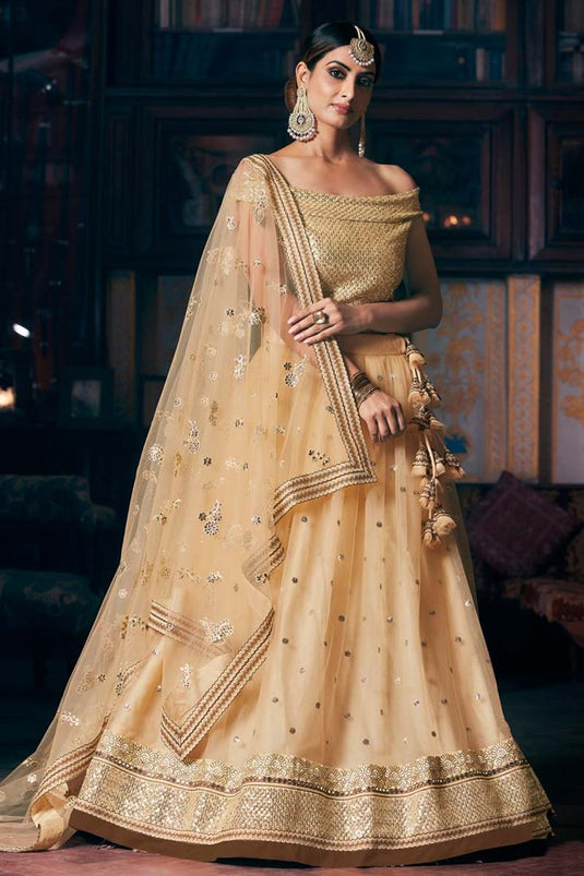 Magnificent Sangeet Wear Net Fabric Cream Color Embroidered Work Lehenga