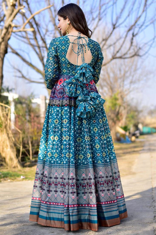 Party Wear Cyan Color Fashionable Printed Long Gown In Fancy Fabric