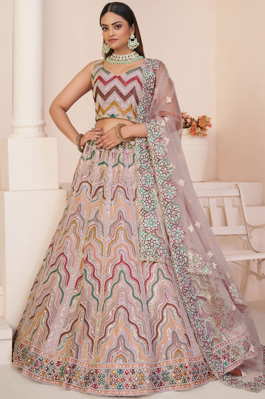 Embroidered Peach Color Bridal Lehenga Choli In Net Fabric