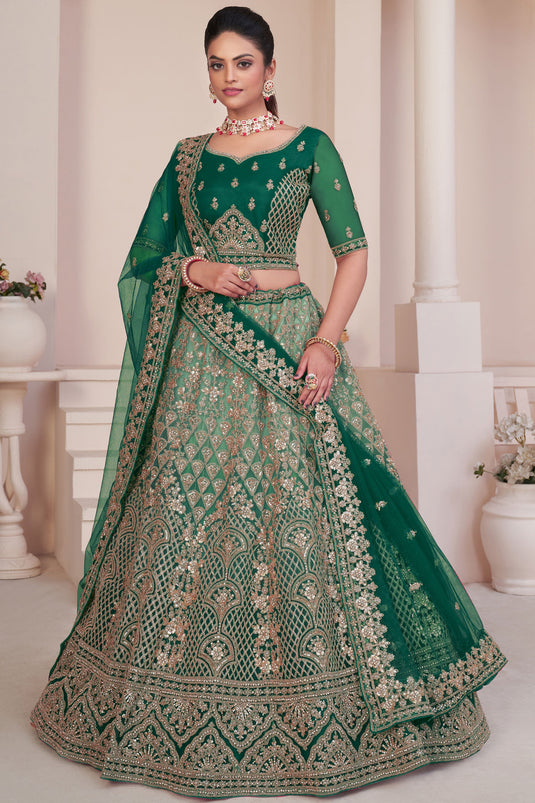 Embroidery Work Net Fabric Bridal Lehenga Choli In Green Color