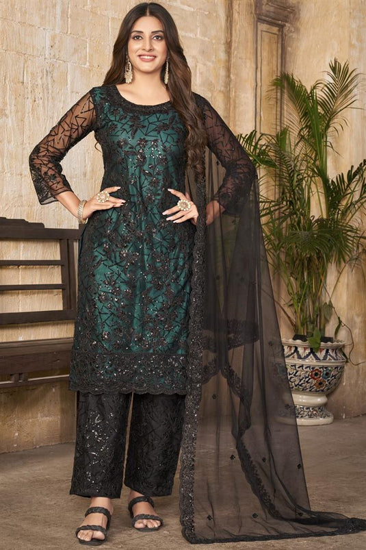 Pleasant Net Fabric Embroidered Salwar Suit In Dark Green Color