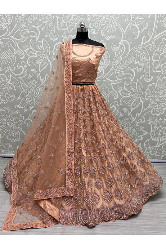 Peach Color Net Fabric Remarkable Bridal Lehenga For Wedding