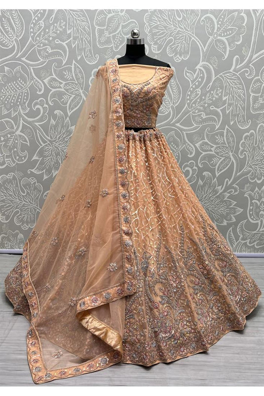 Awesome Heavy Look Embroidered Work On Net Fabric Peach Color Bridal Lehenga Choli
