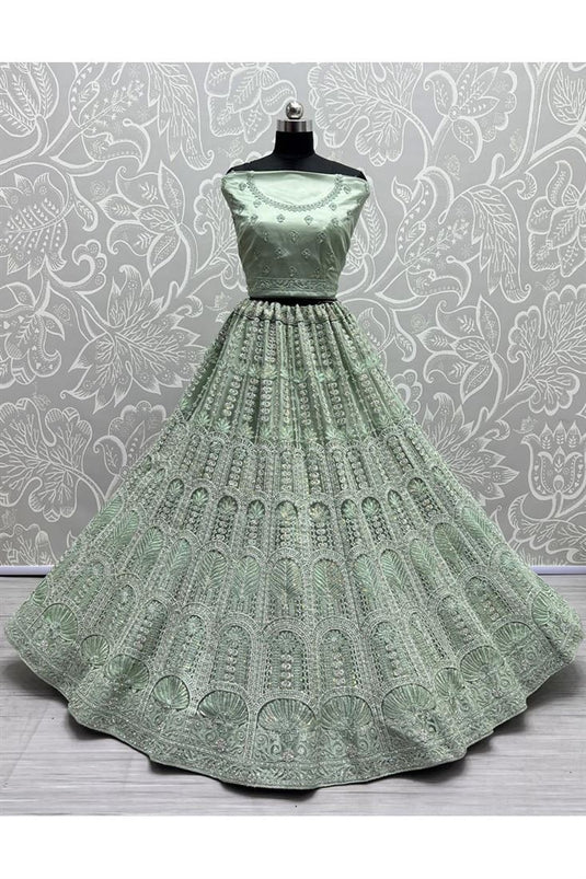 Heavy Embroidered Sea Green Color Bridal Look Fancy Lehenga Choli In Net Fabric